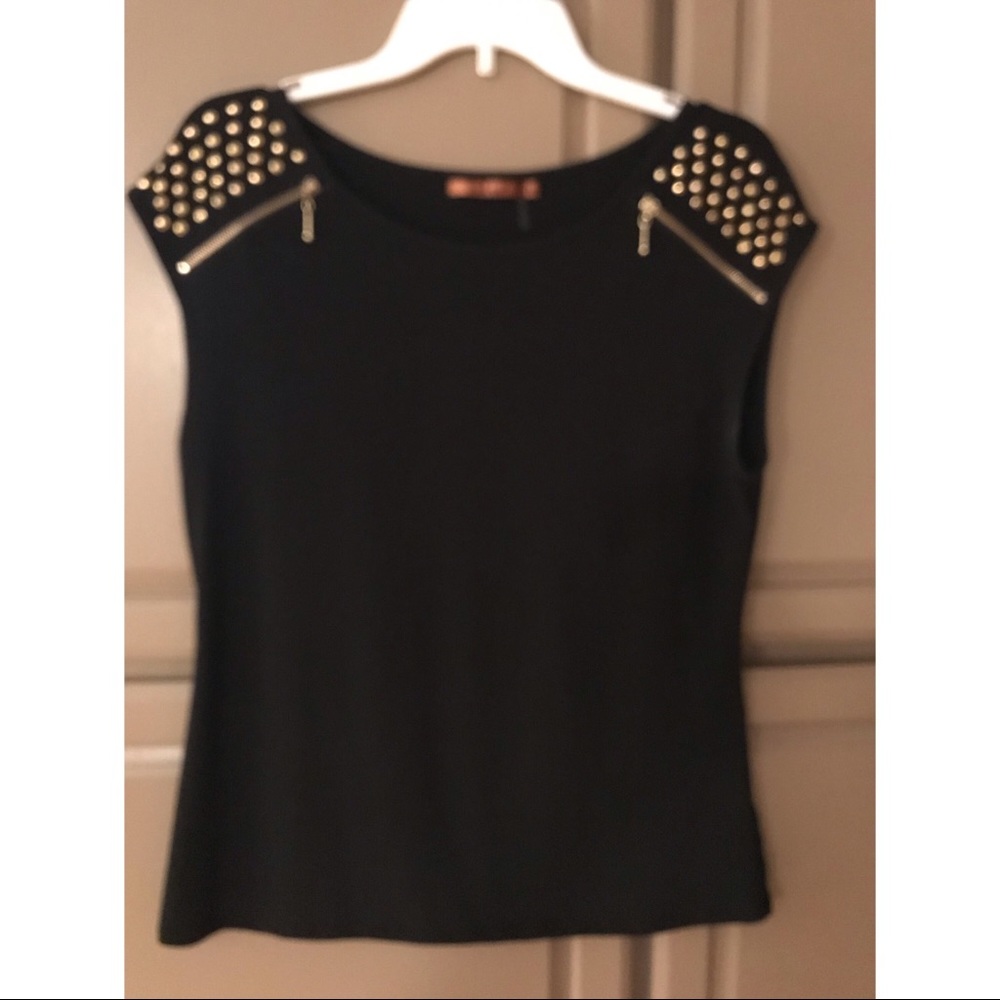 Top with gold accents.  Like new.